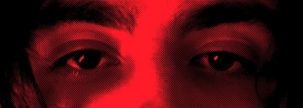 A photo of someones eyes, in red.